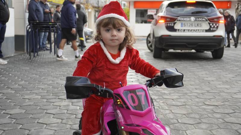Revving up for Christmas! Santas on bikes help those in need